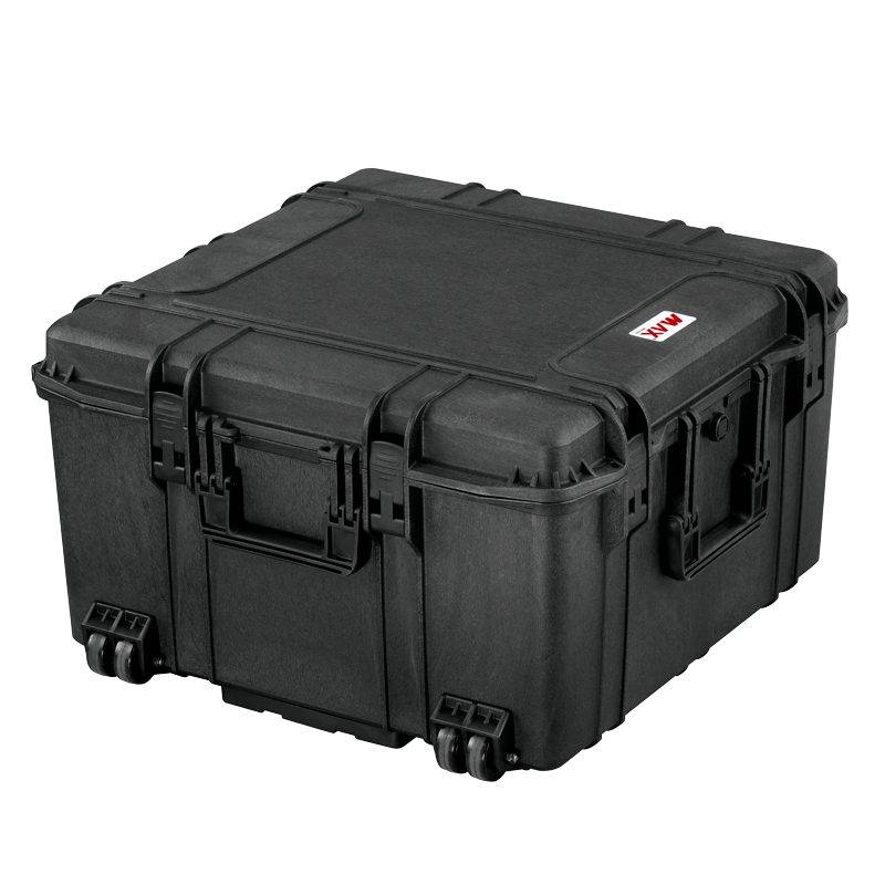 The MAX615 is a black hard-shell watertight case featuring latches, handles, wheels, a small top-right label, and an automatic pressure release valve for added protection.