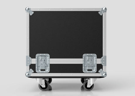 The Medium Motorsport Engine Flight Case (775 x 650 x 650 mm) in black and silver, featuring metal corners, latches, and wheels, is displayed against a plain light gray background.