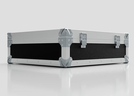 The Microphone Case is a rectangular, silver and black hard case with reinforced metal corners and two metal latches, measuring 577 x 526 x 192 mm, shown resting on a reflective white surface.