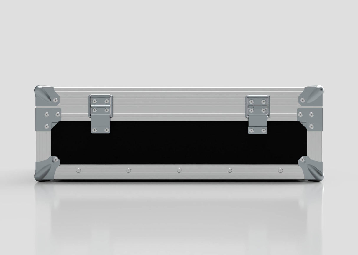 A closed, rectangular Microphone Case in silver with reinforced metal corners and two latches sits on a reflective surface; its external dimensions are 577 x 526 x 192 mm.