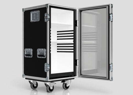 The Medium Fridge Case is a black, wheeled storage unit with metal edges and handles. Shown with its door open, it has horizontal ventilation slits and an empty interior. External dimensions: 485 x 541 x 1003 mm.