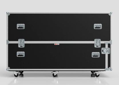 A Motorbike Case in large black rectangular form (2100 x 750 x 1150 mm), with metal edges, handles, latches, and four caster wheels, is shown against a plain light background.