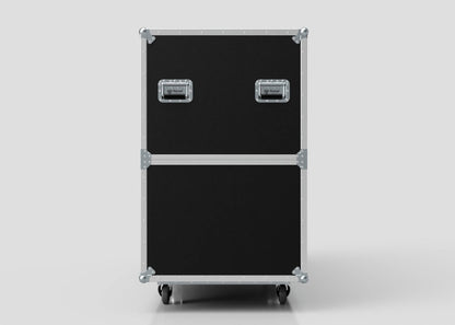 The Motorbike Case, a black rectangular equipment case with metal edges, corner reinforcements, two handles, and four caster wheels, stands upright against a plain background; its external dimensions are 2100 x 750 x 1150 mm.