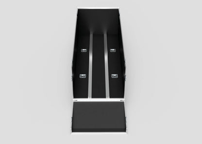 The Motorbike Case is a black, rectangular open box with a hinged lid, metal reinforcements, and two parallel grooves on the base. Seen from above, its external dimensions are 2100 x 750 x 1150 mm.