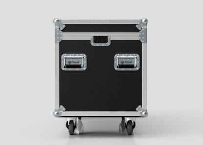 The Multicore Trunk Case, shown from the front against a plain background, is a black and silver rolling equipment case with metal reinforcements and handles, designed for secure transport like a rugged external storage box.