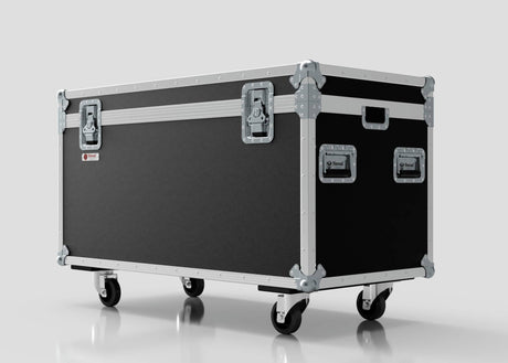 The Multicore Trunk Case, a large black and silver external storage box with metal edges, four handles, two latches, and four caster wheels, is shown against a white background.