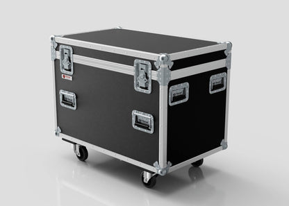 The MUT Trunk Case is a black road case with metal reinforcements, handles, latches, and wheels on a plain light background. It features a variable divider system and is trunk pack compatible for flexible storage.