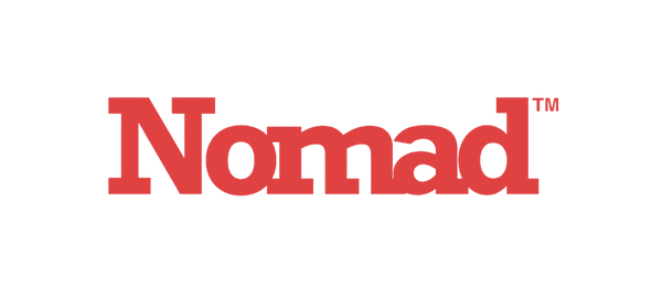 Red Nomad text logo with a trademark symbol in the top right corner on a plain white background.