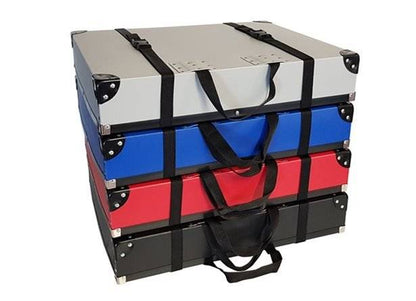 The Print Portfolio features four stacked poly boxes in silver, blue, red, and black with black straps and handles—perfect for mounted print storage.