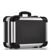 The Robust 50100N is a black and silver briefcase with reinforced corners, a black handle, and custom CNC foam fittings for extra protection, displayed elegantly on a white background.
