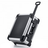 The Robust 50200N (555 x 425 x 235) is a black and silver hard-shell rolling suitcase with a telescopic handle, displayed on one corner. It comes with custom foam fittings for enhanced protection.
