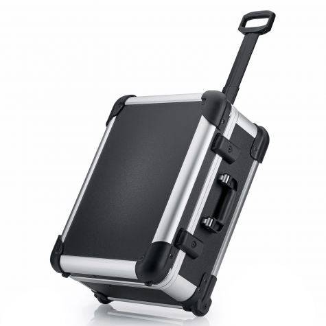The Robust 50200N (555 x 425 x 235) is a black and silver hard-shell rolling suitcase with a telescopic handle, displayed on one corner. It comes with custom foam fittings for enhanced protection.