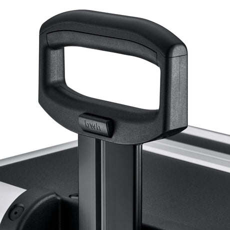 Close-up of a black plastic handle on a metal telescopic rod, with part of the Robust 50200N (555 x 425 x 235) case visible—perfect for protecting gear with custom foam fittings.