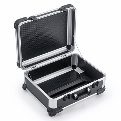 The Robust 50200N (555 x 425 x 235) is a durable, hard-shell suitcase in black with silver trim, featuring a handle, reinforced corners, an open interior with a divider, and space for custom foam fittings.