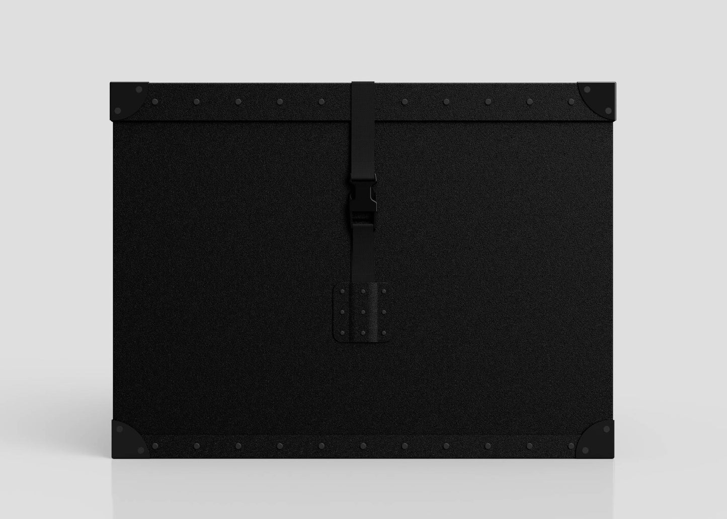 The Standard Cube Storage Box - Large is a rectangular black case with reinforced corners, metal rivets, and a central webbing buckle strap, shown against a plain light background.