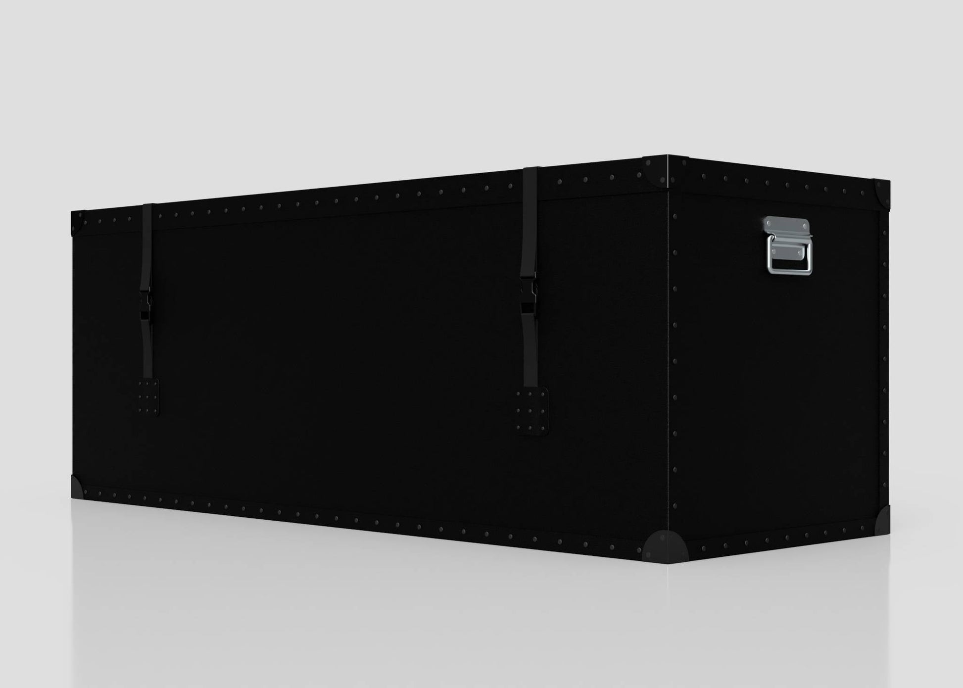 The Standard Long Storage Box - Extra Large is a spacious black rectangular trunk with zinc drop handles and visible rivets, pictured against a plain light background.