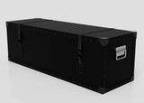 The Standard Long Storage Box - Medium is a large, rectangular black trunk featuring metal corner protectors, zinc drop handles, and two side-release buckle closures, shown on a white background.