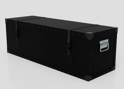 The Standard Long Storage Box - Medium is a large, rectangular black trunk featuring metal corner protectors, zinc drop handles, and two side-release buckle closures, shown on a white background.