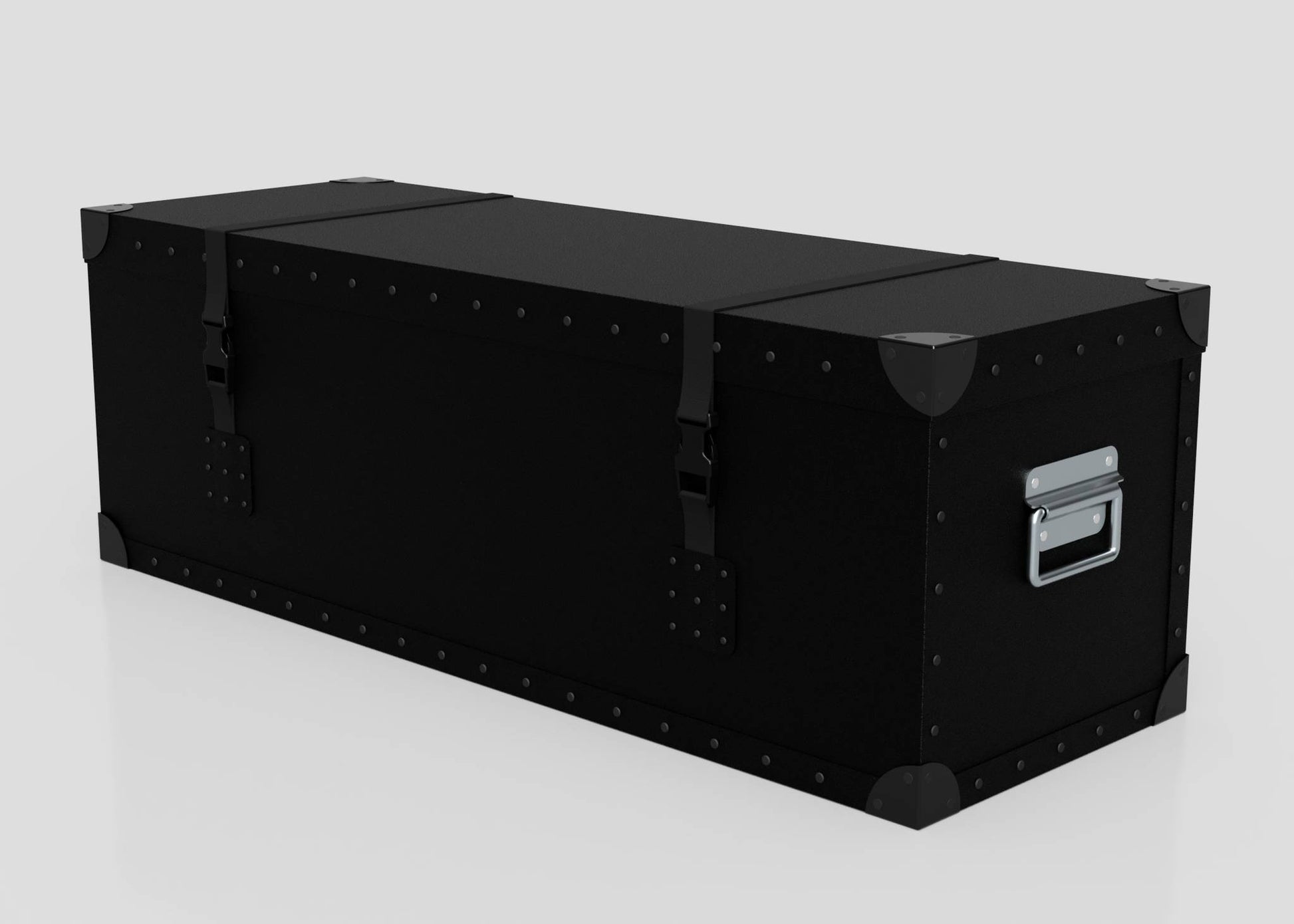 The Standard Long Storage Box - Small is a large, rectangular black trunk with metal-reinforced corners, two latches, and a sturdy zinc drop handle, shown against a plain white background.