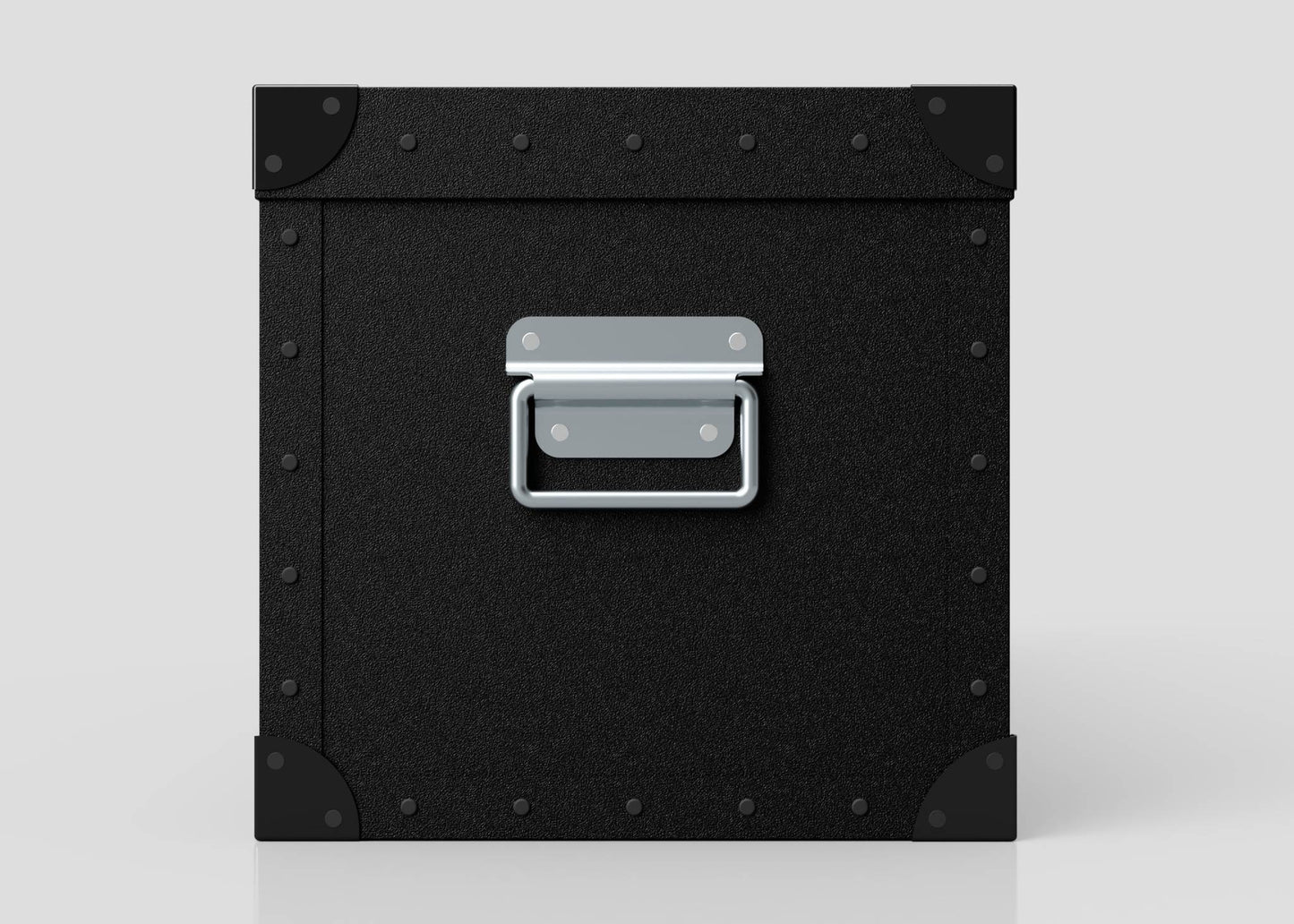 The Standard Long Storage Box - Small, made of black polyethylene with a silver zinc drop handle and riveted corners, is shown on a plain light surface.
