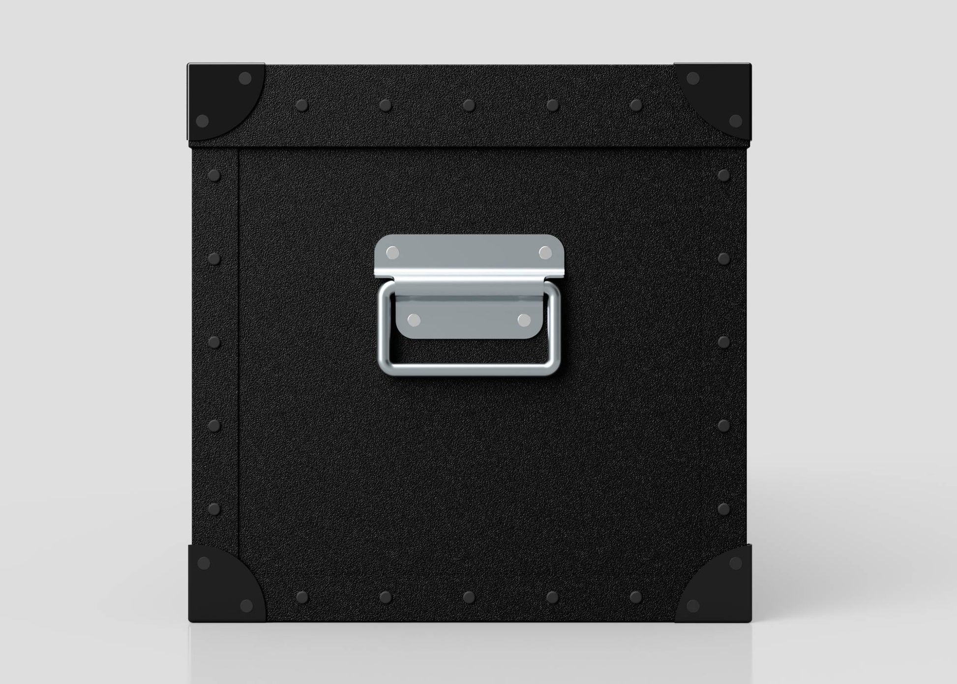 The Standard Long Storage Box - Small, made of black polyethylene with a silver zinc drop handle and riveted corners, is shown on a plain light surface.