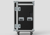 The TM TV Drawer Case is a black and silver wheeled flight case with three metal handles, reinforced corners, latches, and side attaching points—ideal for transporting a trestle table. Set against a plain light background.