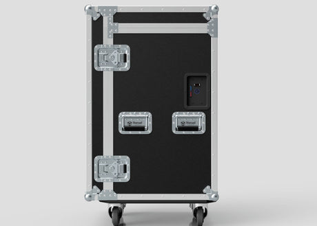 The TM TV Drawer Case is a black and silver wheeled flight case with three metal handles, reinforced corners, latches, and side attaching points—ideal for transporting a trestle table. Set against a plain light background.