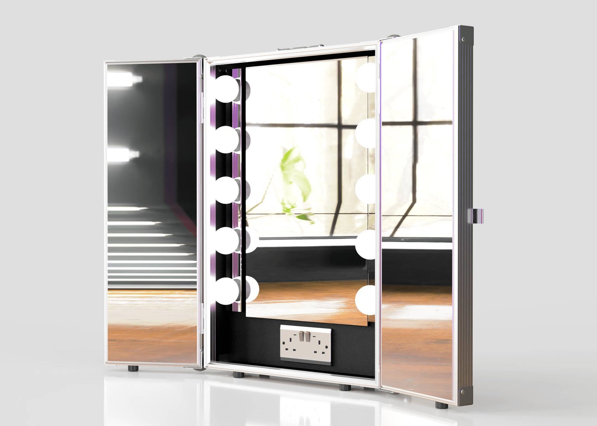 The Vanity Dressing Room Makeup Mirror Case, featuring built-in LED lights and a power outlet, stands open on a wooden surface in a bright room, creating an ideal portable dressing room experience.