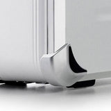 Close-up of the VDK 97100 silver aluminium case corner, showcasing its reinforced protective metal corner and part of the suitcase wheel.