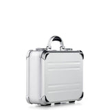 The VDK 97100, a silver aluminium case with rounded corners, a handle, and custom CNC foam fittings, stands upright against a plain white background.