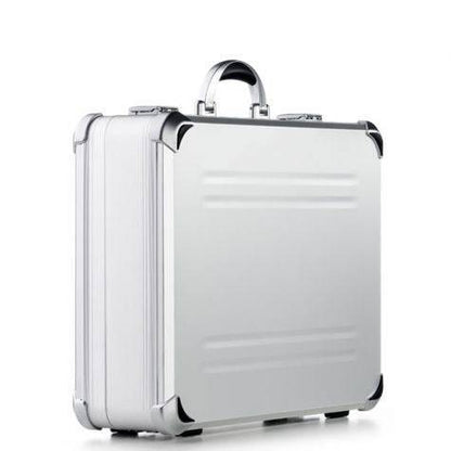 The VDK 97700 features a silver aluminium case with black corner protectors, custom CNC foam fittings, and a metal handle, shown upright on a white background.