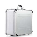 The VDK 97800 is a silver aluminium case with reinforced corners, a black handle, and custom CNC foam fittings, shown standing upright on a white background.