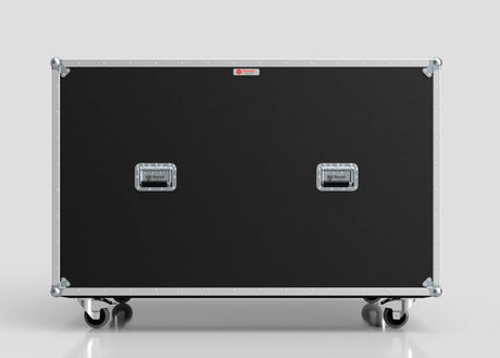 A Washing Machine And Tumble Dryer Case, large and black with metal edges, two handles, and four caster wheels (1512 x 1062 x 1067 mm), is shown against a plain light gray background.