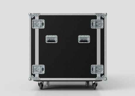 A Washing Machine And Tumble Dryer Case, black and rectangular with metal corners, handles, and latches, measures 1512 x 1062 x 1067 mm and stands on four caster wheels against a plain, light background.