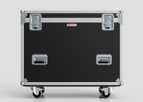 The Yamaha DM7-EX Compact Flight Case, a heavy-duty black and silver 3-part touring case with metal corners, latches, handles, and four caster wheels, stands against a plain background.