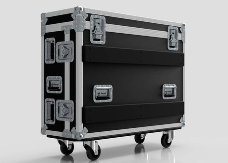 The Yamaha DM7-EX Compact Flight Case | Heavy-Duty 3-Part Touring Case features a black and silver hard shell with metal reinforcements, handles, latches, and four caster wheels—ideal for safely touring professional audio equipment.