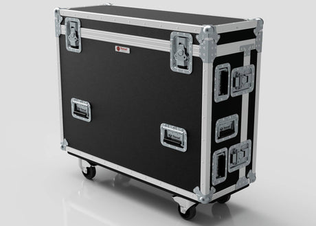 The Yamaha DM7-EX Compact Flight Case is a heavy-duty, 3-part touring case with a black rectangular design, metal reinforcements, handles, corner protectors, and four caster wheels—ideal for professional audio touring.