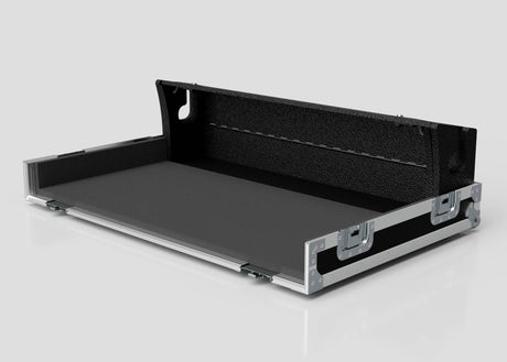 The Yamaha DM7-EX Compact Flight Case, a black hard-shell audio case with silver metal edges and latches, is open to show its flat base and upright back. This heavy-duty 3-part touring case is designed for professional use.