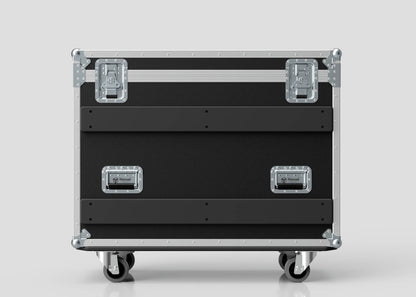 A Yamaha DM7-EX Compact Case in black and silver, featuring metal edges, latches, and handles, is set against a plain light gray background.